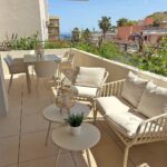 Terrace And The Sea